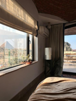Rooms in horse stables near pyramids